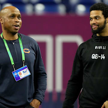 Mar 2, 2024; Indianapolis, IN, USA; Chicago Bears quarterbacks coach Kerry Joseph talks to Southern California quarterback Caleb Williams (QB14) during the 2024 NFL Combine at Lucas Oil Stadium. Mandatory Credit: Kirby Lee-Imagn Images