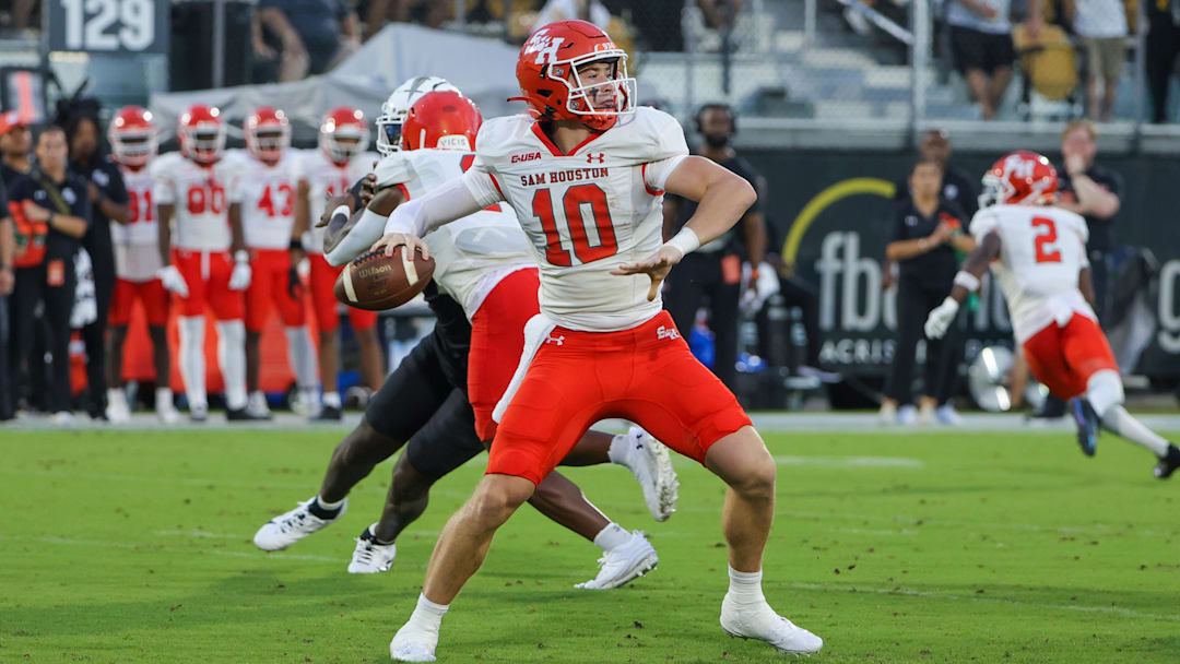 Sep 7, 2024; Orlando, Florida, USA; Sam Houston State Bearkats quarterback Hunter Watson (10) passes the ball during the first quarter against the UCF Knights at FBC Mortgage Stadium. Mandatory Credit: Mike Watters-Imagn Images
