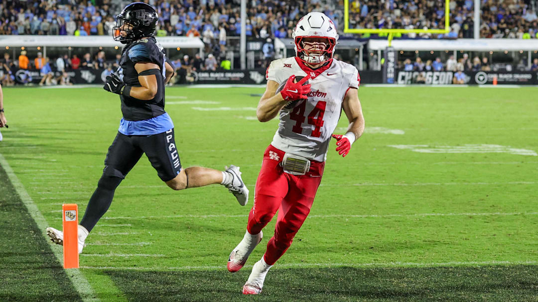 Nov 7, 2025; Orlando, Florida, USA; Houston Cougars running back Dean Connors (44) scores during the second half against the UCF Knights at Acrisure Bounce House. Mandatory Credit: Mike Watters-Imagn Images