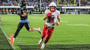 Nov 7, 2025; Orlando, Florida, USA; Houston Cougars running back Dean Connors (44) scores during the second half against the UCF Knights at Acrisure Bounce House. Mandatory Credit: Mike Watters-Imagn Images