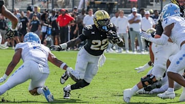 Sep 20, 2025; Orlando, Florida, USA; UCF Knights running back Myles Montgomery (22) carries the ball during the first quarter against the North Carolina Tar Heels at the Bounce House Stadium. Mandatory Credit: Mike Watters-Imagn Images
