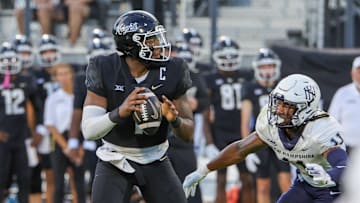 Aug 29, 2024; Orlando, Florida, USA; UCF Knights quarterback KJ Jefferson (1) looks to pass during the first quarter against the New Hampshire Wildcats at FBC Mortgage Stadium. Mandatory Credit: Mike Watters-USA TODAY Sports