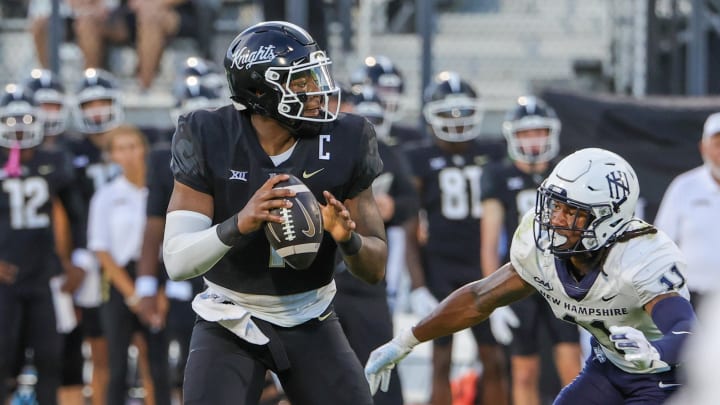 Aug 29, 2024; Orlando, Florida, USA; UCF Knights quarterback KJ Jefferson (1) looks to pass during the first quarter against the New Hampshire Wildcats at FBC Mortgage Stadium. Mandatory Credit: Mike Watters-USA TODAY Sports