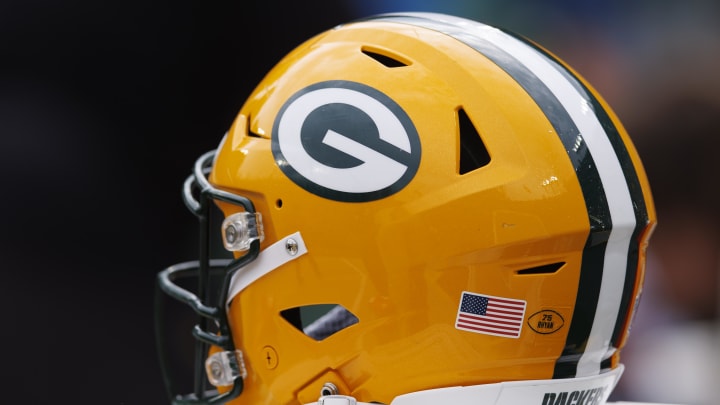 Sep 24, 2023; Green Bay, Wisconsin, USA;  A Green Bay Packers helmet sits on the sidelines during the game against the New Orleans Saints at Lambeau Field. Mandatory Credit: Jeff Hanisch-USA TODAY Sports