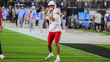 Nov 7, 2025; Orlando, Florida, USA; Houston Cougars quarterback Conner Weigman (1) warms up before the game against the UCF Knights at Acrisure Bounce House. Mandatory Credit: Mike Watters-Imagn Images