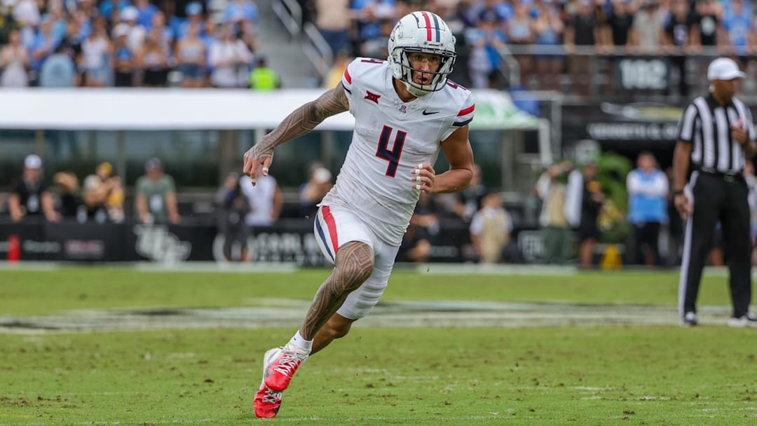 Nov 2, 2024; Orlando, Florida, USA; Arizona Wildcats wide receiver Tetairoa McMillan (4) during the second quarter against the UCF Knights at FBC Mortgage Stadium.