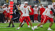 Houston Cougars quarterback Conner Weigman (1) drops back to pass during the first quarter against the UCF Knights at Acrisure Bounce House. 