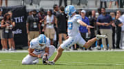 Sep 20, 2025; Orlando, Florida, USA; North Carolina Tar Heels place kicker Rece Verhoff (90) warms up before the game against the UCF Knights at the Bounce House Stadium. Mandatory Credit: Mike Watters-Imagn Images