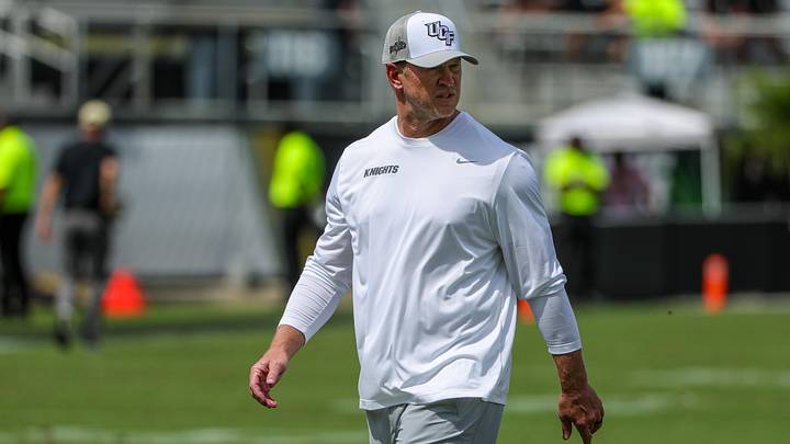 Sep 20, 2025; Orlando, Florida, USA; UCF Knights head coach Scott Frost looks on during warmups before the game against the North Carolina Tar Heels at the Bounce House Stadium. Mandatory Credit: Mike Watters-Imagn Images