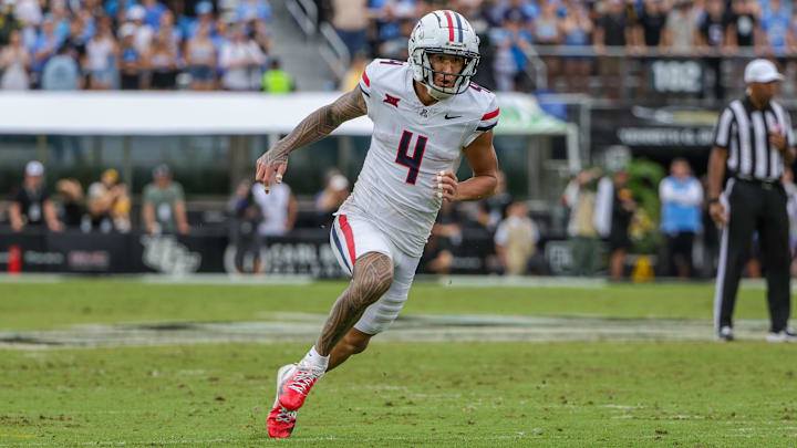 Nov 2, 2024; Orlando, Florida, USA; Arizona Wildcats wide receiver Tetairoa McMillan (4) during the second quarter against the UCF Knights at FBC Mortgage Stadium. Mandatory Credit: Mike Watters-Imagn Images