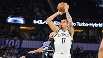 Nov 14, 2025; Orlando, Florida, USA; Brooklyn Nets forward Michael Porter Jr. (17) shoots in front of Orlando Magic guard Jalen Suggs (4) during the first quarter at Kia Center. Mandatory Credit: Mike Watters-Imagn Images