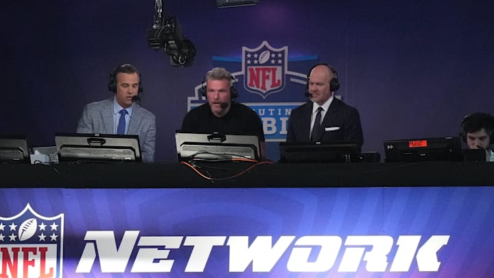 ESPN and NFL Network hosts Daniel Jeremiah, Pat McAfee and Rich Eisen during the 2024 NFL Combine at Lucas Oil Stadium