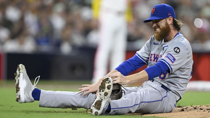 Aug 23, 2024; San Diego, California, USA; New York Mets starting pitcher Paul Blackburn (58) reacts after being hit during the third inning against the San Diego Padres at Petco Park. Mandatory Credit: Denis Poroy-USA TODAY Sports