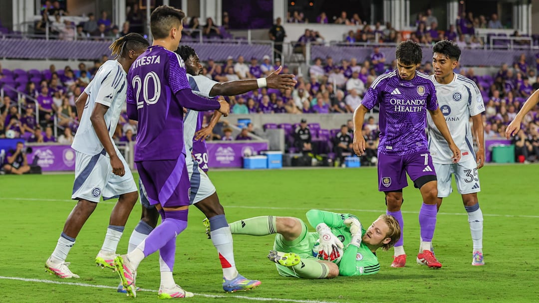 May 31, 2025; Orlando, Florida, USA; Chicago Fire goalkeeper Chris Brady (1) makes a save during the second half against Orlando City at Inter&Co Stadium. Mandatory Credit: Mike Watters-Imagn Images