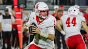 Nov 7, 2025; Orlando, Florida, USA; Houston Cougars quarterback Conner Weigman (1) looks to pass during the first quarter against the UCF Knights at Acrisure Bounce House. Mandatory Credit: Mike Watters-Imagn Images