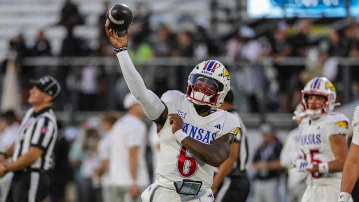 Oct 4, 2025; Orlando, Florida, USA; Kansas Jayhawks quarterback Jalon Daniels (6) warms up before the game against the UCF Knights at FBC Mortgage Stadium. Mandatory Credit: Mike Watters-Imagn Images Oct 4, 2025; Orlando, Florida, USA; Kansas Jayhawks quarterback Jalon Daniels (6) warms up before the game against the UCF Knights at FBC Mortgage Stadium. Mandatory Credit: Mike Watters-Imagn Images
