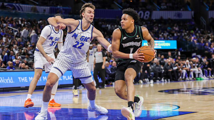 Apr 8, 2026; Orlando, Florida, USA; Minnesota Timberwolves guard Terrence Shannon Jr. (1) drives around Orlando Magic forward Franz Wagner (22) during the second quarter at Kia Center. Mandatory Credit: Mike Watters-Imagn Images
