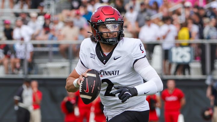 Oct 12, 2024; Orlando, Florida, USA; Cincinnati Bearcats quarterback Brendan Sorsby (2) looks to pass during the first quarter against the UCF Knights at FBC Mortgage Stadium. Mandatory Credit: Mike Watters-Imagn Images