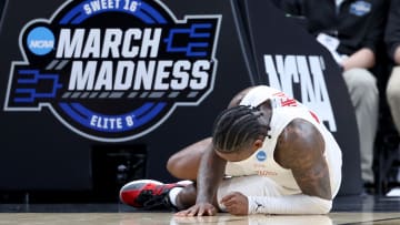 Mar 29, 2024; Dallas, TX, USA; Houston Cougars guard Jamal Shead (1) lies on the floor after an