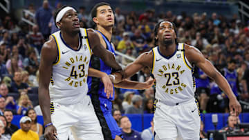Mar 10, 2024; Orlando, Florida, USA; Indiana Pacers forward Pascal Siakam (43) forward Aaron Nesmith (23) and Orlando Magic guard Caleb Houstan (2) look for the rebound during the second quarter at KIA Center. Mandatory Credit: Mike Watters-Imagn Images