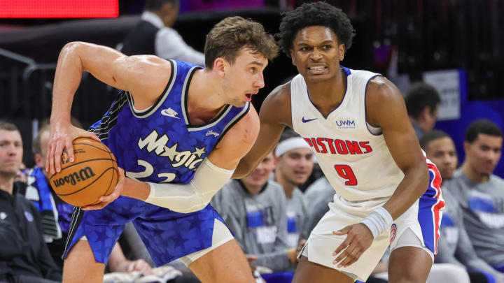 Mar 3, 2024; Orlando, Florida, USA; Detroit Pistons forward Ausar Thompson (9) defends Orlando Magic forward Franz Wagner (22): Mike Watters-USA TODAY Sports