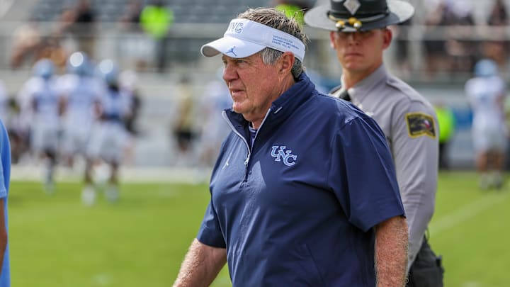 Sep 20, 2025; Orlando, Florida, USA; North Carolina Tar Heels head coach Bill Belichick walks into the field before the game against the UCF Knights at the Bounce House Stadium. Mandatory Credit: Mike Watters-Imagn Images