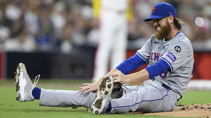 Aug 23, 2024; San Diego, California, USA; New York Mets starting pitcher Paul Blackburn (58) reacts after being hit during the third inning against the San Diego Padres at Petco Park. Mandatory Credit: Denis Poroy-USA TODAY Sports