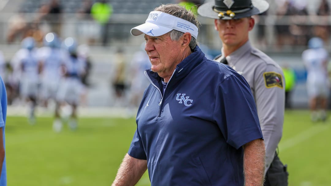 Sep 20, 2025; Orlando, Florida, USA; North Carolina Tar Heels head coach Bill Belichick walks into the field before the game against the UCF Knights at the Bounce House Stadium. Mandatory Credit: Mike Watters-Imagn Images