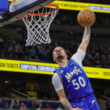 Orlando Magic guard Cole Anthony dunks during the second half against the Milwaukee Bucks at KIA Center.