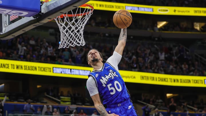 Orlando Magic guard Cole Anthony dunks during the second half against the Milwaukee Bucks at KIA Center.