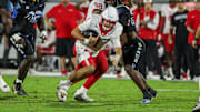 Nov 7, 2025; Orlando, Florida, USA; Houston Cougars quarterback Conner Weigman (1) carries the ball during the first quarter against the UCF Knights at Acrisure Bounce House. 