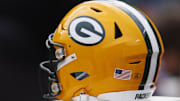 Sep 24, 2023; Green Bay, Wisconsin, USA;  A Green Bay Packers helmet sits on the sidelines during the game against the New Orleans Saints at Lambeau Field. Mandatory Credit: Jeff Hanisch-Imagn Images