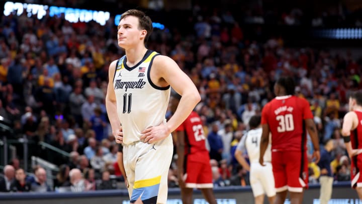 Mar 29, 2024; Dallas, TX, USA; Marquette Golden Eagles guard Tyler Kolek (11) reacts during the second half in the semifinals of the South Regional of the 2024 NCAA Tournament against the North Carolina State Wolfpack at American Airlines Center. Mandatory Credit: Kevin Jairaj-USA TODAY Sports 