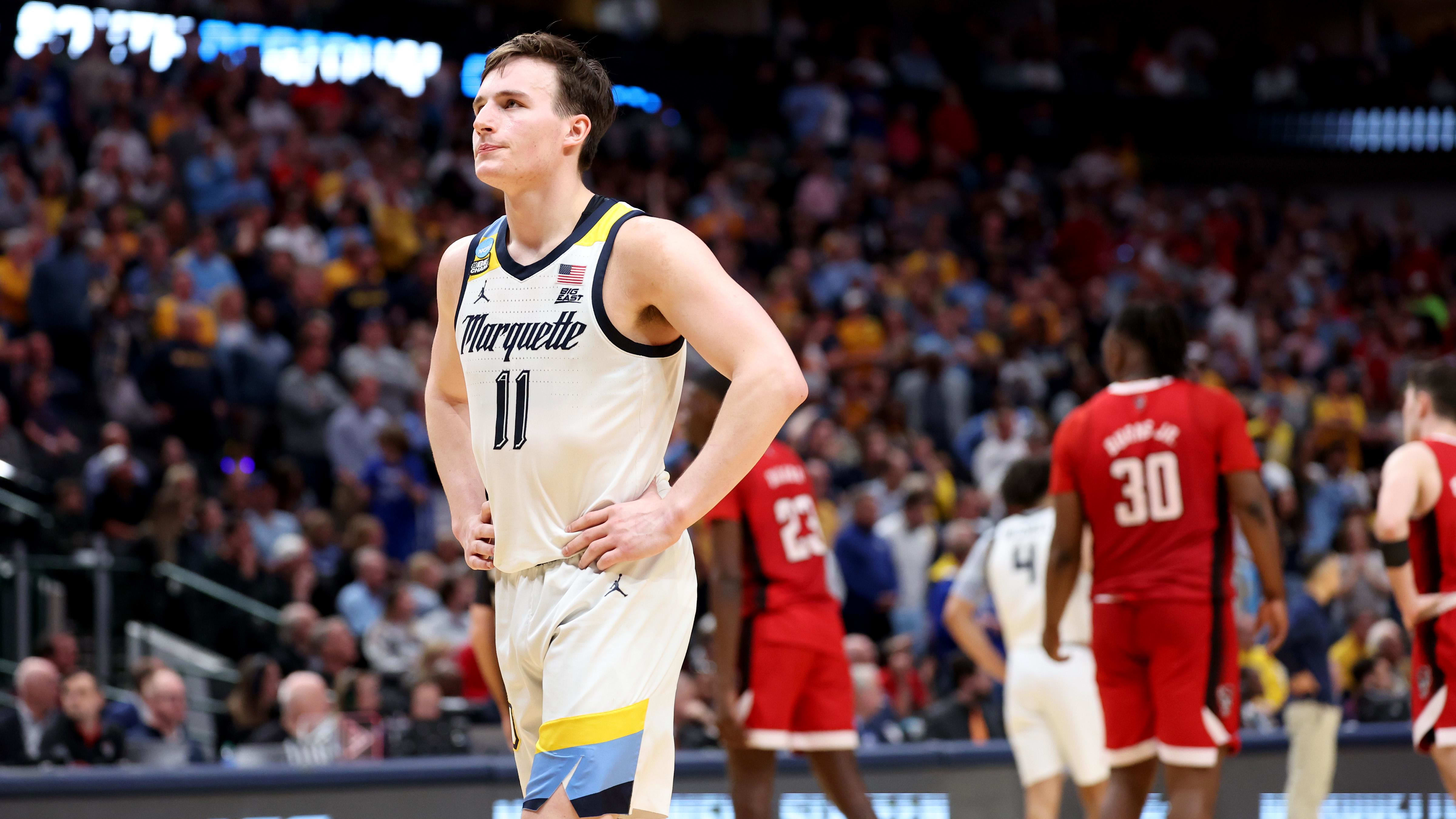 Mar 29, 2024; Dallas, TX, USA; Marquette Golden Eagles guard Tyler Kolek (11) reacts during the