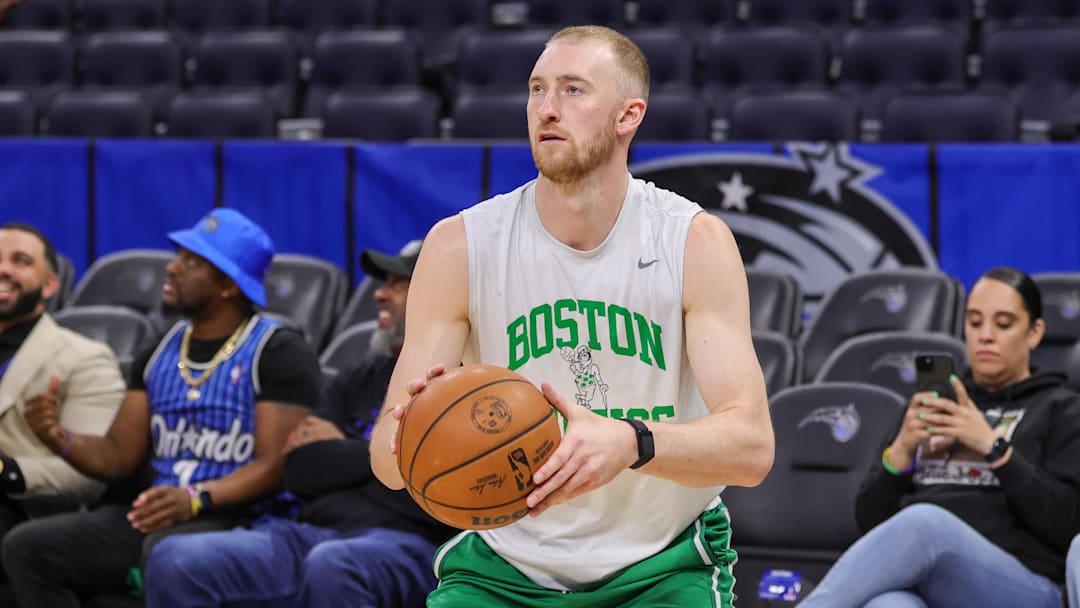 Apr 9, 2025; Orlando, Florida, USA; Boston Celtics forward Sam Hauser (30) warms up before the game against the Orlando Magic at Kia Center. Mandatory Credit: Mike Watters-Imagn Images