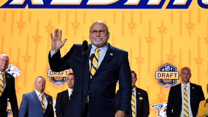 Jun 28, 2023; Nashville, Tennessee, USA; Nashville Predators incoming general manager Barry Trotz announces the twenty fourth pick in round one of the 2023 NHL Draft at Bridgestone Arena. Mandatory Credit: Christopher Hanewinckel-USA TODAY Sports