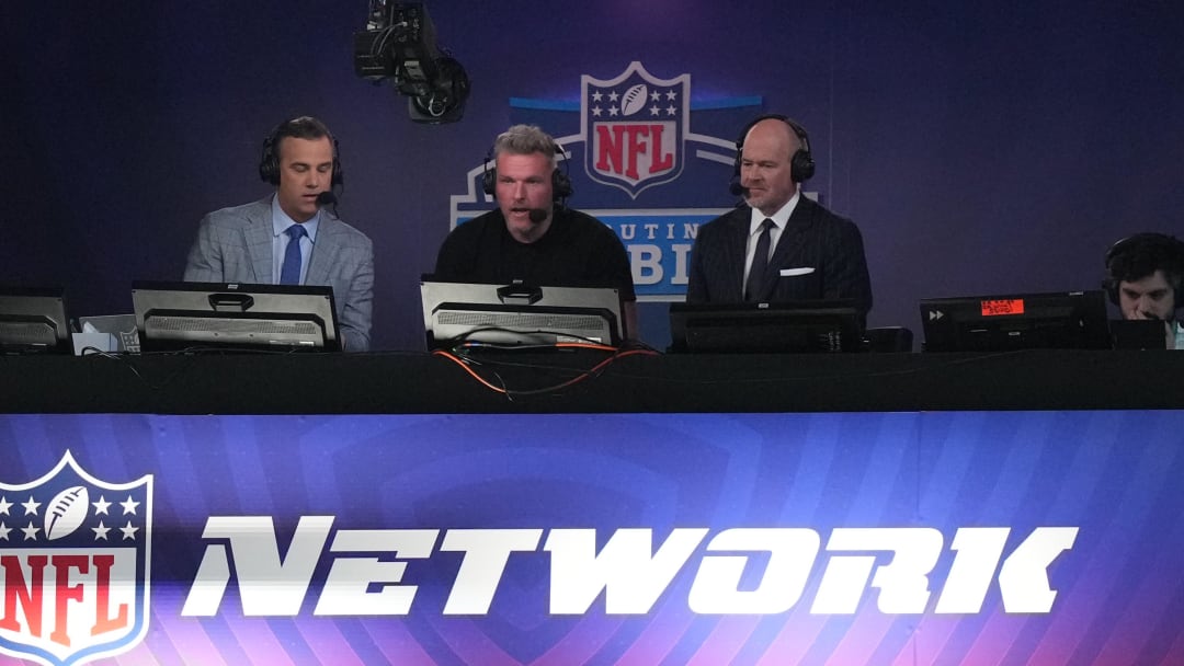Mar 2, 2024; Indianapolis, IN, USA; NFL Network hosts Daniel Jeremiah (left), Pat McAfee (center)