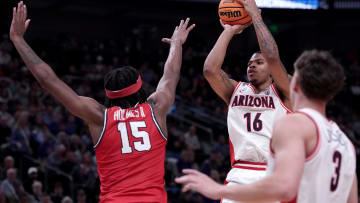 Mar 23, 2024; Salt Lake City, UT, USA; Arizona Wildcats forward Keshad Johnson (16) shoots against Dayton Flyers forward DaRon Holmes II (15) during the second half in the second round of the 2024 NCAA Tournament at Vivint Smart Home Arena-Delta Center. Mandatory Credit: Gabriel Mayberry-USA TODAY Sports