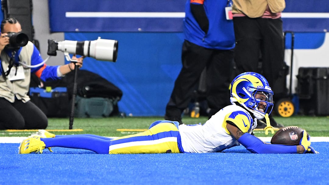 Jan 14, 2024; Detroit, Michigan, USA; Los Angeles Rams wide receiver Tutu Atwell (5) celebrates after a touchdown during the first half of a 2024 NFC wild card game against the Detroit Lions at Ford Field. Mandatory Credit: Lon Horwedel-Imagn Images Jan 14, 2024; Detroit, Michigan, USA; Los Angeles Rams wide receiver Tutu Atwell (5) celebrates after a touchdown during the first half of a 2024 NFC wild card game against the Detroit Lions at Ford Field. Mandatory Credit: Lon Horwedel-Imagn Images