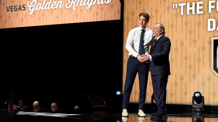 Jun 28, 2023; Nashville, Tennessee, USA; Vegas Golden Knights draft pick David Edstrom shakes hands with NHL commissioner Gary Bettman after being selected with the thirty second pick in round one of the 2023 NHL Draft at Bridgestone Arena. Mandatory Credit: Christopher Hanewinckel-USA TODAY Sports