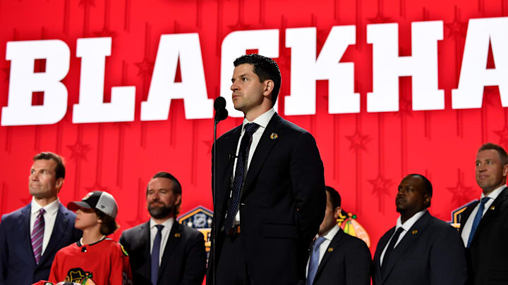 Jun 28, 2023; Nashville, Tennessee, USA; Chicago Blackhawks general manager Kyle Davidson makes the nineteenth pick in round one of the 2023 NHL Draft at Bridgestone Arena. Mandatory Credit: Christopher Hanewinckel-Imagn Images