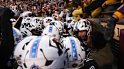 Nov 1, 2025; Minneapolis, Minnesota, USA; Minnesota Golden Gophers players celebrate Minnesota Golden Gophers quarterback Drake Lindsey’s game winning touchdown during overtime against the Michigan State Spartans at Huntington Bank Stadium. Mandatory Credit: Matt Krohn-Imagn Images