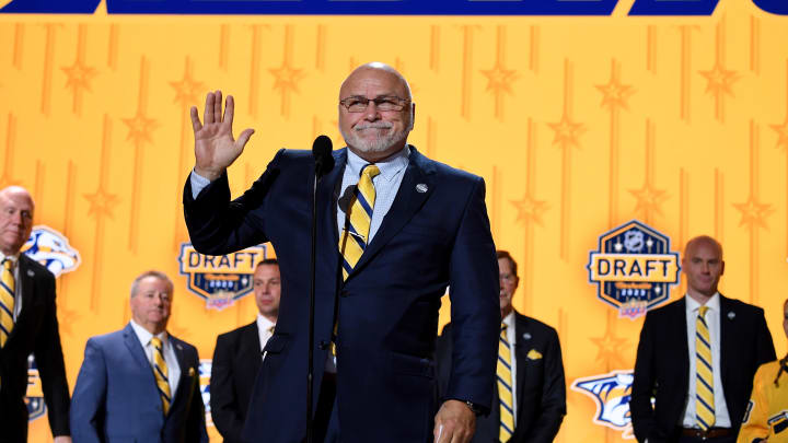 Jun 28, 2023; Nashville, Tennessee, USA; Nashville Predators incoming general manager Barry Trotz announces the twenty fourth pick in round one of the 2023 NHL Draft at Bridgestone Arena. Mandatory Credit: Christopher Hanewinckel-USA TODAY Sports