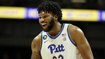 Jan 8, 2022; Pittsburgh, Pennsylvania, USA; Pittsburgh Panthers forward John Hugley (23) reacts on the court against the Boston College Eagles during the second half at the Petersen Events Center. The Panthers won 69-67. Mandatory Credit: Charles LeClaire-Imagn Images