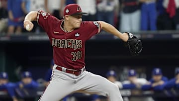 Oct 27, 2023; Arlington, TX, USA; Arizona Diamondbacks pitcher Paul Sewald (38) throws during the ninth inning in game one of the 2023 World Series against the Texas Rangers at Globe Life Field. Mandatory Credit: Raymond Carlin III-Imagn Images