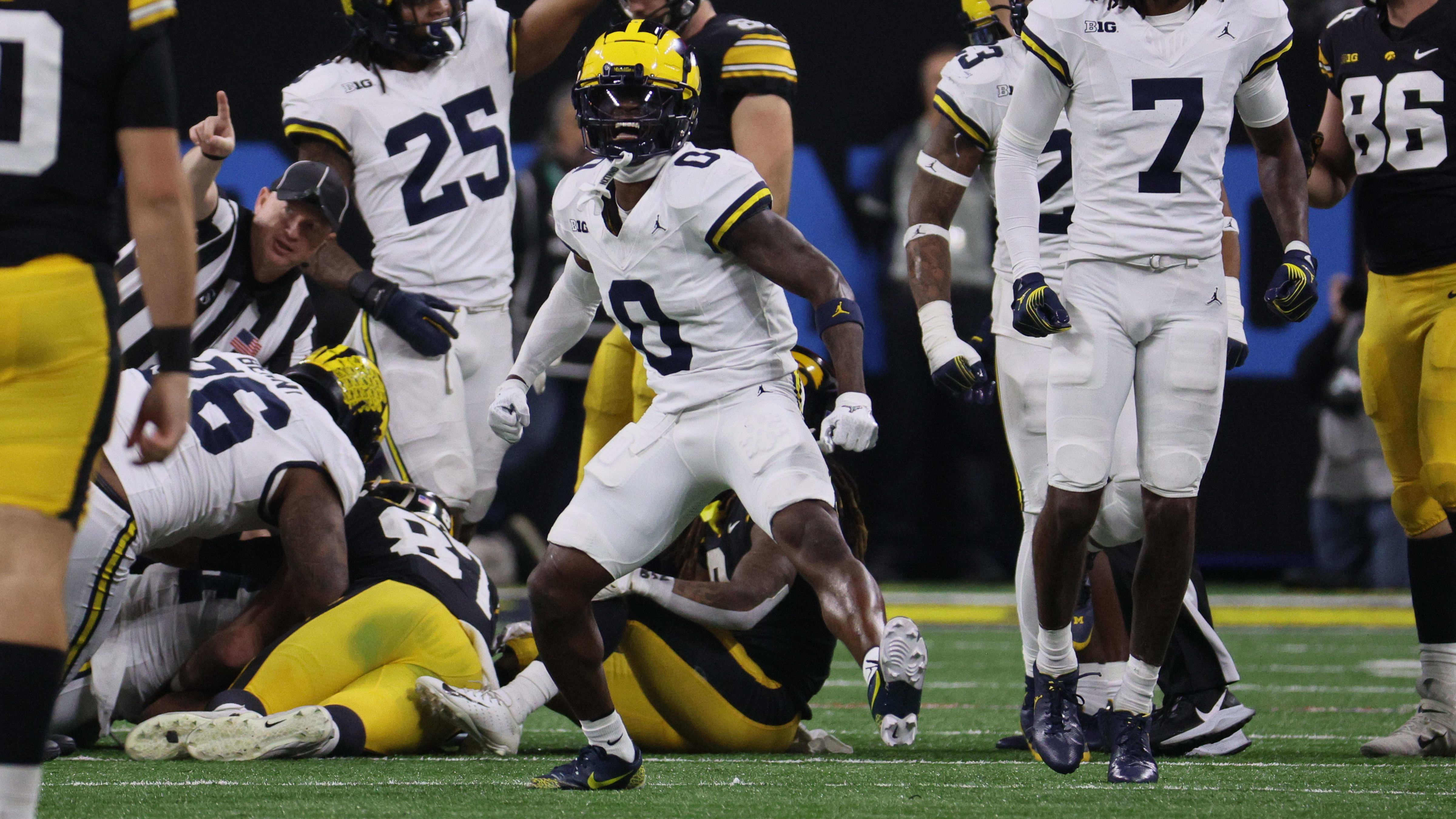 Michigan Wolverines defensive back Mike Sainristil reacts during a game.
