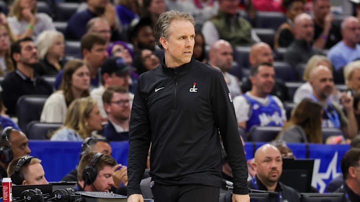 Feb 23, 2025; Orlando, Florida, USA; Washington Wizards head coach Brian Keefe looks on during the second quarter against the Orlando Magic at Kia Center. Mandatory Credit: Mike Watters-Imagn Images