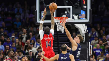 Mar 21, 2024; Orlando, Florida, USA; New Orleans Pelicans forward Brandon Ingram (14) shoots the ball against Orlando Magic forward Franz Wagner (22) during the first quarter at KIA Center