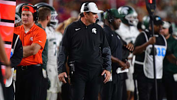 Sep 20, 2025; Los Angeles, California, USA; Michigan State Spartans head coach Jonathan Smith watches game action against the Southern California Trojans during the second half at the Los Angeles Memorial Coliseum. Mandatory Credit: Gary A. Vasquez-Imagn Images