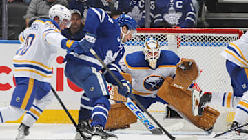 Devon Levi (27) facing a shot from Auston Matthews of the Toronto Maple Leafs earlier this year. 